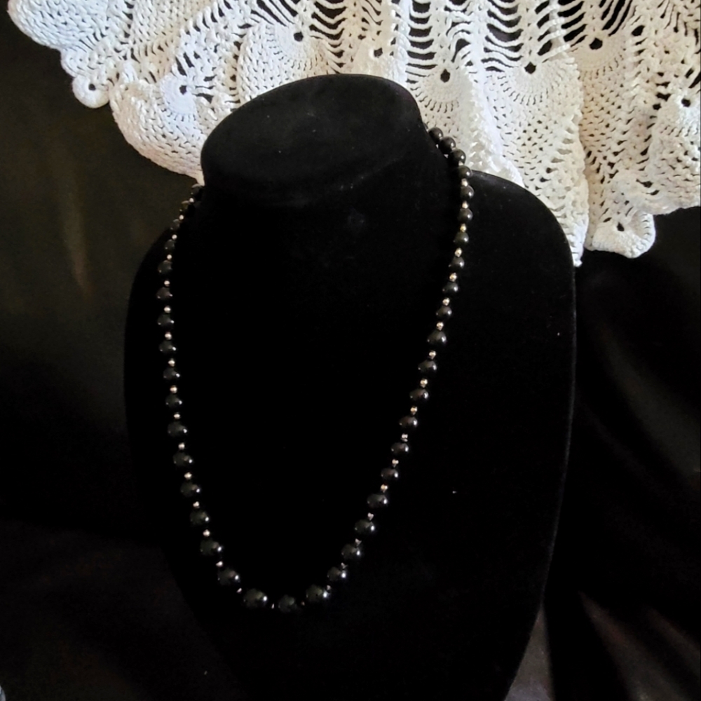 Black and gold tone beads necklace